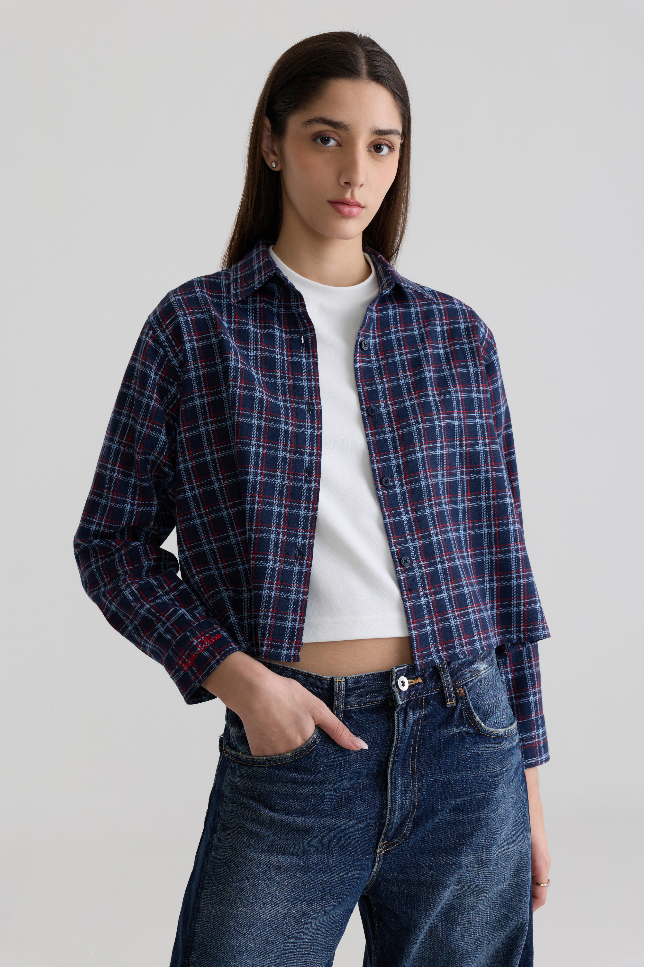 Blue women’s signature check flannel shirt front view on white background